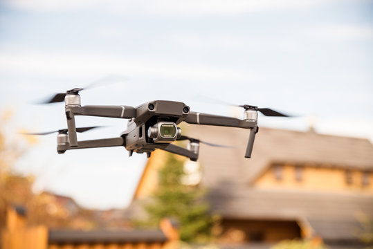 A flight of drons behind a blurred background shot with a forward