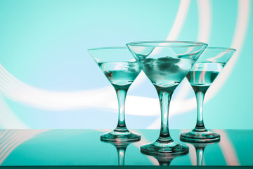 alcoholic glass in the club entourage, copy space, red background