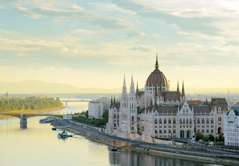Fototapeta na wymiar Hungarian parliament in Budapest and Danube river. Morning view