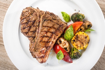 grilled t-bone steak with vegetables