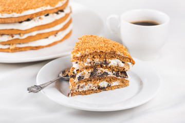 delicious piece cake with coffee cup