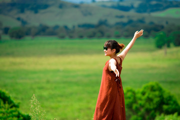 Japanese girl poses for picture in Gold Coast, Australia. Gold Coast is one of the Australia's tourist destination points.