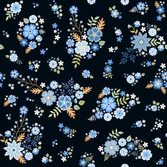 Cute ditsy seamless floral pattern with groups of blue flowers on black background. Fashion design. Print for fabric. Vector illustration.