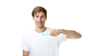 Young man with toothbrush isolated on white background