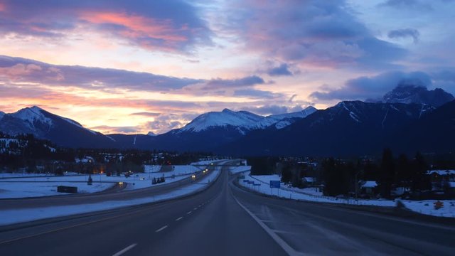 Sunrise in the Rocky Mountains. Travelling on the TransCanada highway in Canmore, Alberta.