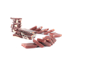 slices of original milk chocolate .isolated on white