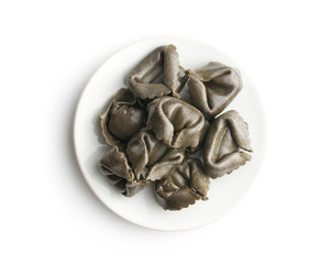 Squid ink tortellini pasta.