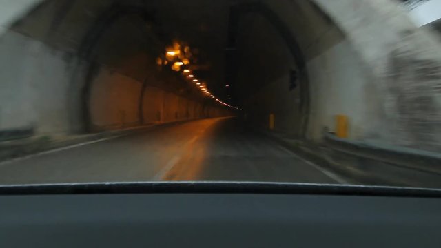 Driving through tunnel on the E90 in Sicily, Italy.