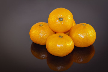 tangerines on black background