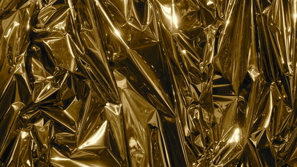 Golden metal foil, wrinkled and shiny.
Close-up, abstract image background