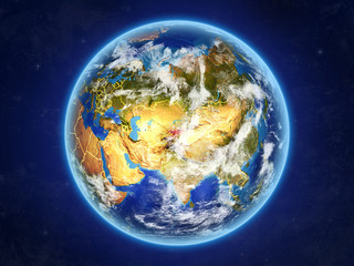 Kyrgyzstan from space. Planet Earth with country borders and extremely high detail of planet surface and clouds.