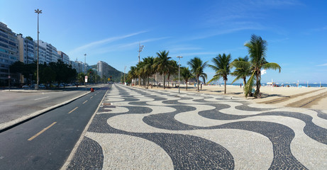 Copacabana Beach Rio de Janeiro boardwalk with  blue sky