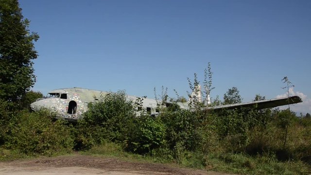Wreck of Douglas C-47. Old Abandoned plane at Yugoslav Air Base Zeljava on the Croatian-Bosnian border. Yugoslavia's largest and secret underground airport.  Zeljava Underground Airbase near Bihac