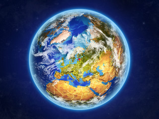 Estonia from space. Planet Earth with country borders and extremely high detail of planet surface and clouds.