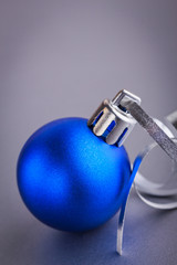 Naklejka na ściany i meble Christmas composition of Christmas tree toys on a blurred silver background
