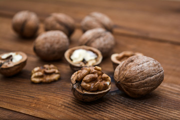 Walnuts closeup on a wooden background.