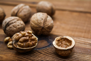 Walnuts closeup on a wooden background.