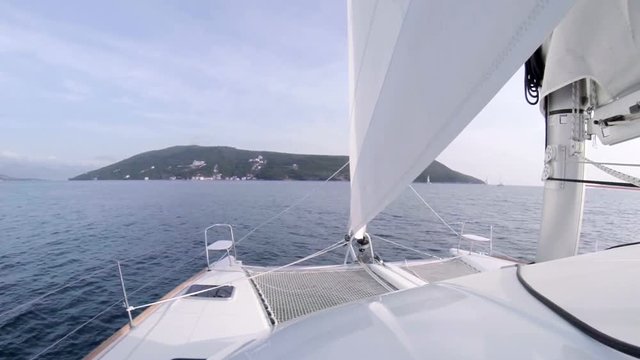 Catamaran boat sails on the sea