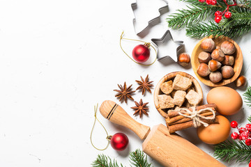 Christmas food baking background top view on white background.