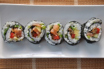 Sushi. Delicious meal with fish, rice and supplements, prepared at home.