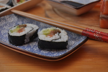 Sushi. Delicious meal with fish, rice and supplements, prepared at home.