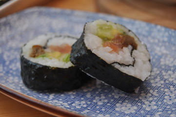 Sushi. Delicious meal with fish, rice and supplements, prepared at home.