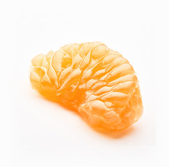 Juicy tangerine. Peeled tangerine or clementine or orange fruit with leaves isolated on white background