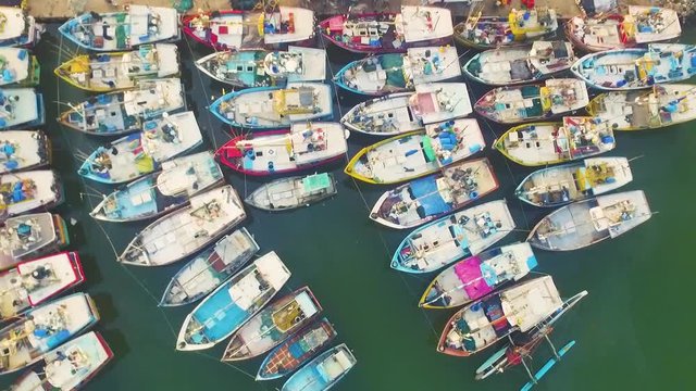 Aerial drone footage of Colorful Fishing Boats in Sri Lanka in sunset, Tangalle, Kudawella