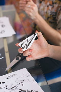 Close up of anonymous hands making homemade rubber stamps