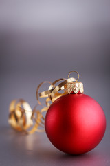 Christmas composition of Christmas tree toys on a blurred silver background