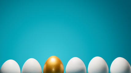 Concept of individuality, exclusivity, better choice. One golden egg among white eggs on blue...