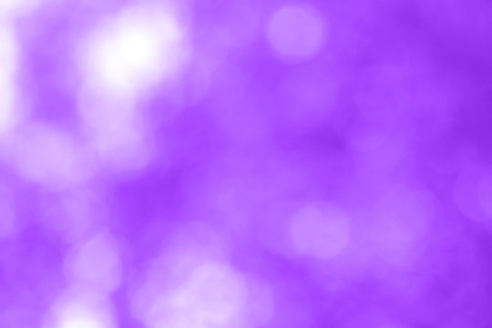 Abstract blur background has bokeh and proton purple color. Horizontal background for design. Selective focus.
