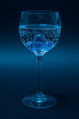 glass of water on black background