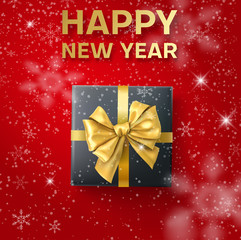 Red shiny Happy New Year card with top view gift with golden bow and snow.