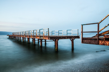 Metal pier in lake