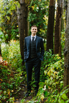 Portrait of Groom Standing in Northwest Forest