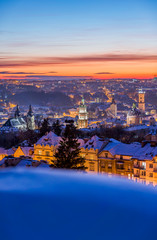 Old city towers with evening lights. Winter atmosphere.