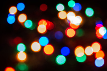 Christmas atmosphere recreated through the typical Christmas lights, with the decorated Christmas tree.