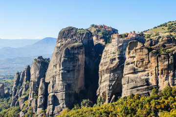 Fototapeta na wymiar The rocky temple Christian Orthodox complex of Meteora is one of the main attractions of the north of Greece and one of the oldest temples of the country, located high on the rocks.