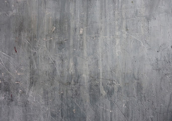 Grey scratched concrete wall