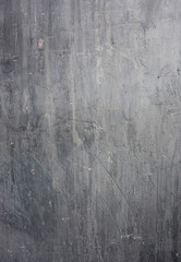 Grey scratched concrete wall