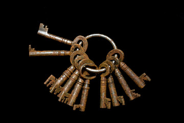 Bunch of Vintage Antique Risty Keys on Black Background