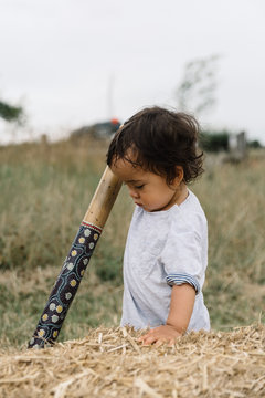 Baby Boy with Didgeridoo