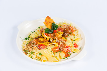 Pasta with cherry tomatoes, cheese and grilled meat