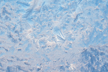 Abstract frosty pattern on glass, background texture