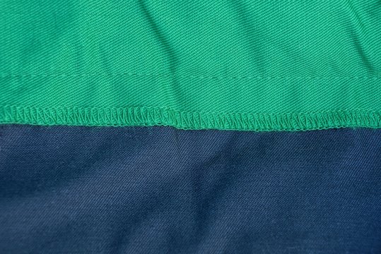 Green Black Texture Fabric Of Clothing With A Seam