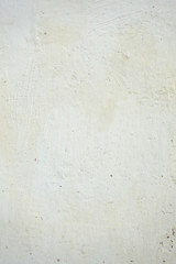 vertical whitewashed uneven wall