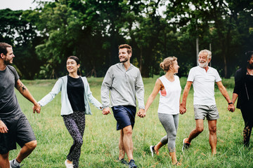 Happy diverse people enjoying in the park