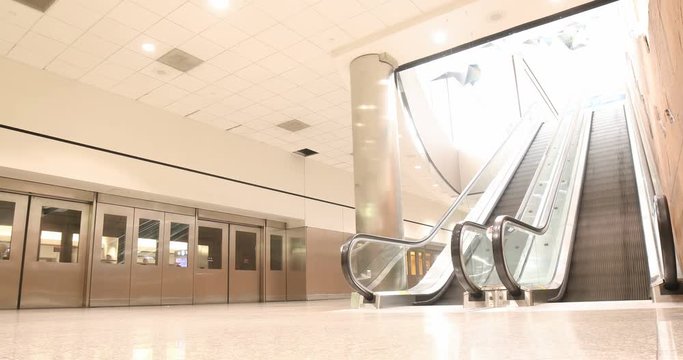 Looping people at train stop and escalator - Time lapse 4k