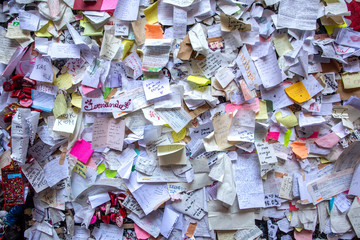 Fototapeta premium Graffiti on the brick vole Juliet's house in Verona. Wall covered with love messages, Juliet's House, Verona, Italy.
